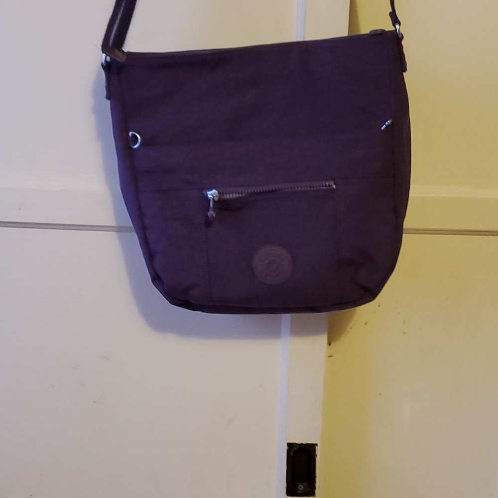 Go out the door Hand Bag. She'll Love it!